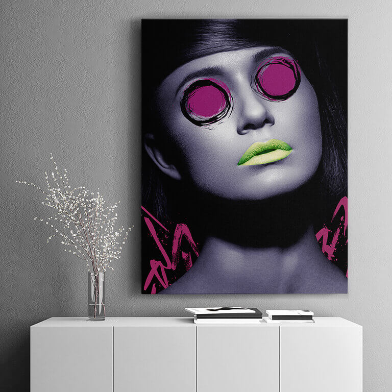 woman with green lips canvas art above credenza